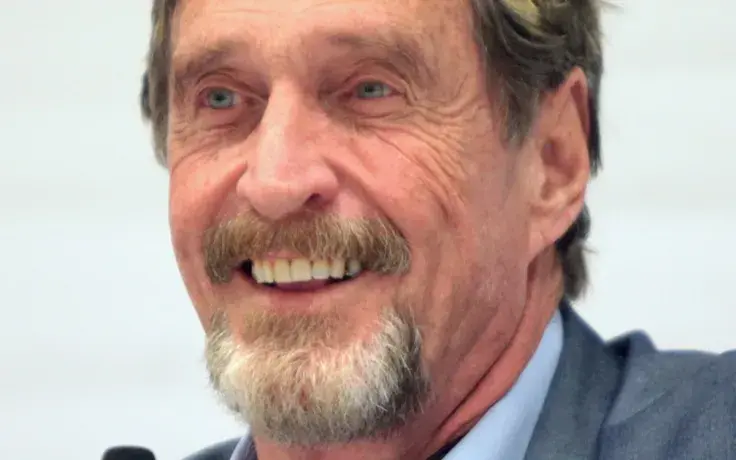 John McAfee: $400,000?? Bitcoin Price Must Hit $1 Mln In Two Years!